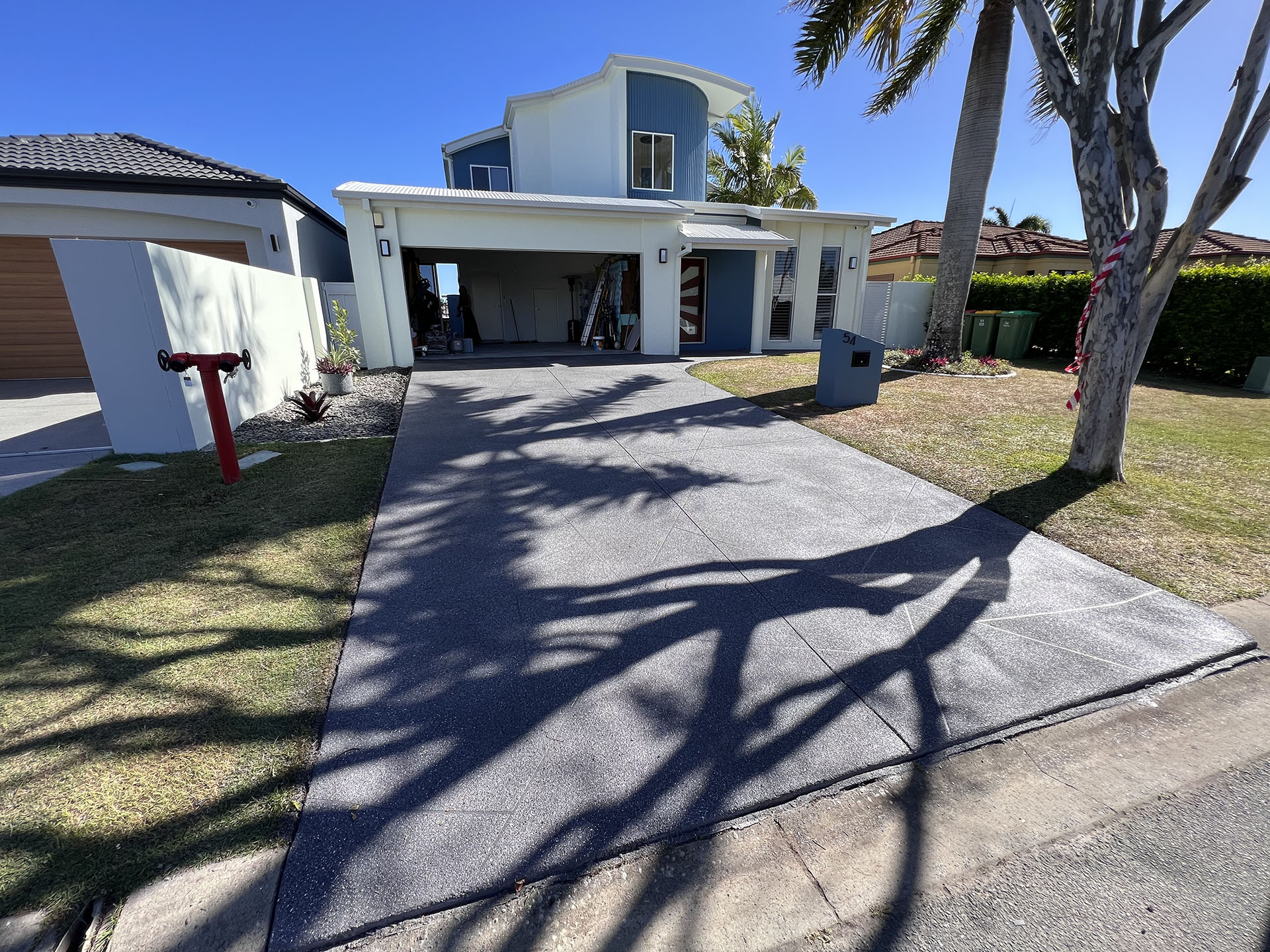Concrete driveway replacement Gold Coast residential home