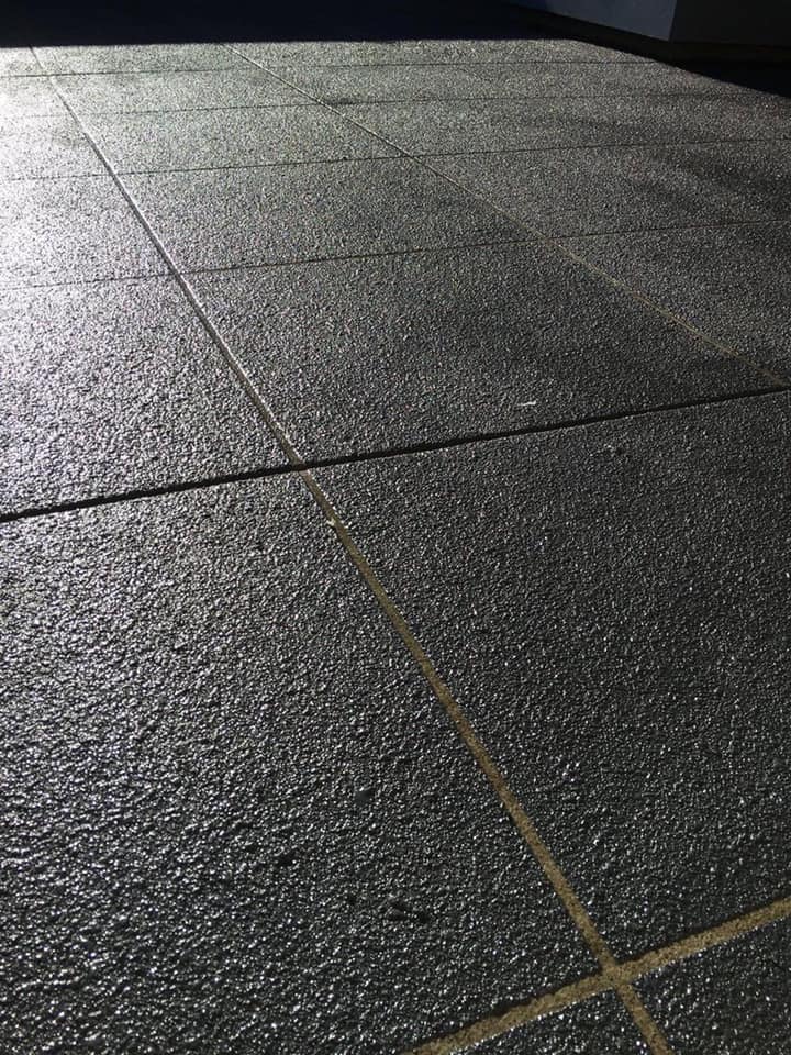 Dark exposed aggregate concrete finish Gold Coast